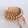 Female bag on a magnet, gold color
