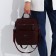 Women's backpack made of artificial leather with lightning, 2 pockets, burgundy color