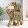 Polystone souvenir "Elephant with an elephant on the back - exotic flowers" 16x6.5x20.5 cm