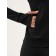 Longslit female Resport, on a zipper, p. 48, the color is black, basic, with a long sleeve