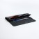 Women's wallet on the button, black color