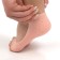 Socks for pedicure, silicone, with perforation, with a separator, 17 × 7 cm, beige color