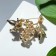 Brooch "Pearls" with glass sheets, white-blue color in gold