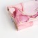 Women's wallet on the button, pink color