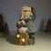 Souvenir Ceramics Light "Baby in a gray coat, with a penguin on the gift" 12x6.5x20 cm