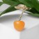 Brooch "Cherry" with a leaf, the color of orange-green in gold