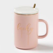 Ceramic mug with a lid and a spoon 