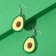 Avocado plastic earrings are large, the color is green-brown