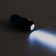 A container with a flashlight, cleaning packages for dogs (roll 15 pcs), blue