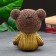 The piggy bank "Bear in a jacket with heart" brown, bronze, 19 cm
