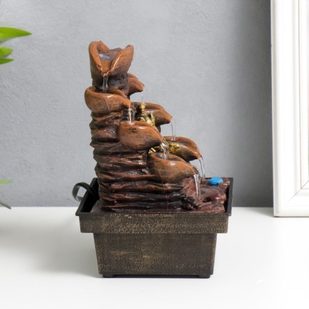 The desktop fountain from the Ganesh network at the cliff with a waterfall 18x12x12 cm-3