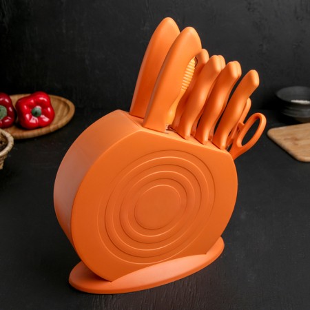 A set of kitchen knives on a stand, 8 knives, knife, scissors, orange color