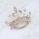 Brooch "Crown", white color in gold