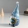 Polystone souvenir "Santa Claus in a cap with stars, with a wreath and a bird" 10x8.5x21 cm