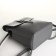 City backpack made of artificial leather with lightning, the color is gray