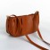 Bag Cross-Bodi with a zipper, the color is red