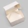 The box is folding, with a window, white, 15 x 10 x 7 cm