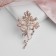 Brooch "Flower Brush", white color in gold