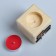 A candle in a wooden candlestick "Cube, hieroglyphs. Harmony", Cherry aroma