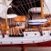 The ship souvenir "conductor", 3 masts, white side, black stand, white sails