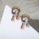 Earrings with pearls "melting", gray color in gold