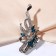 Brooch "Flower bow", white-blue color in silver