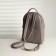 A backpack with a zipper, Textura, external pocket, gray-beige color