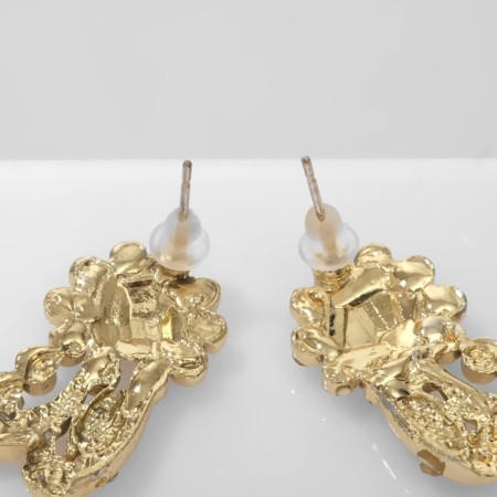 Earrings with rhinestones "flowers" bends, white color in gold-2