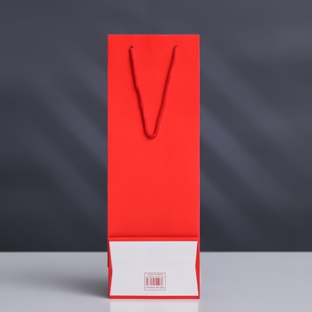 A package for a bottle with a plastic window 12.5 × 8.5 × 36 cm, red-1