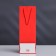 A package for a bottle with a plastic window 12.5 × 8.5 × 36 cm, red
