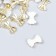 Decor for creativity plastic "Bows" gold set 30 pcs 0.9x1.3 cm