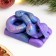 New Year. Symbol 2025. Figure soap "Snake Tourist" Blue with gilding