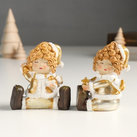 Souvenir Polystone "Baby in a gold caftan and cap, sits" mix 4x5x8 cm