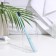 The toothbrush is soft, in the tube, turquoise