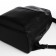 City backpack, textura made of artificial leather with zipper, outer pocket, black color