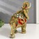 Polystone souvenir "Elephant in Red Popone with gold patterns and mirrors" 18.5x8x23 cm