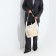 Bag-mech "Golden Rain" on lightning, 3 outer pockets, long belt, beige color