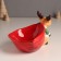 Ceramics stand "Elk in a green fur coat with a large red bag" 12.5x19.1x13.1 cm