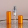 Perfume bottle, with a spray, 10 ml, golden color