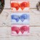 Thermonacles for 7 icons “Bows”, 7.3 x 34.2 cm.