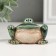 Souvenir ceramics "Green frog with legs on the knees" 4.7x7.2x4.5 cm