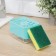 A dispenser for a detergent with a sponge stand, 250 ml, a sponge in the kit, the color is turquoise