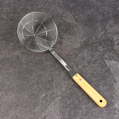 A colander-sytoos with a wooden handle 39cm, diameter13cm, depth 4.5cm