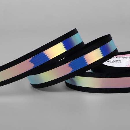 The tape is decorative, with holography, 25 mm × 9.1 ± 0.5 m, black color