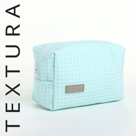 Cosmetic bag at the zipper textura, turquoise color