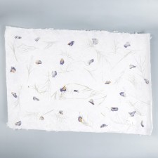 Handmade paper with flowers and herbs 