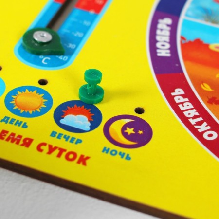 The training calendar “Studying the seasons” 27x20 cm, with a clock, made of wood-5