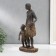 Polystone souvenir "African with son" under a tree 32x15.5x9 cm