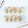 A set of clothespins for decorating the ista "Rabbits", 10 x 12 cm.