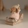 Souvenir Polystone "Baby in a sled, flies from the hill" Pink 9x7.8x9 cm